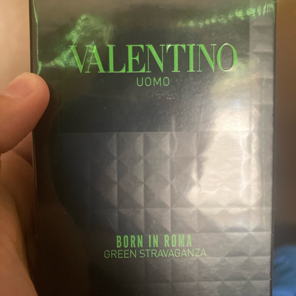 Valentino Fragrance Packaging with Black and Gold Accents